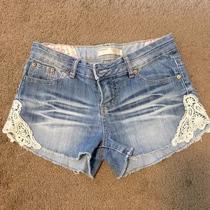 Denim shorts with lace trim